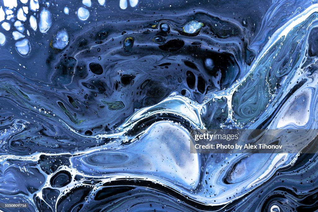 Abstract colourful background texture fluid art acrylic paints. Blue colour