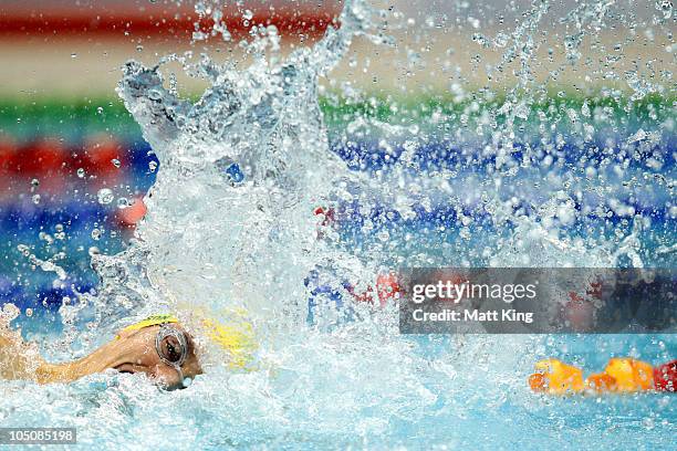 Kyle Richardson of Australia competes in the Men's 4x100m Medley Relay at Dr. S.P. Mukherjee Aquatics Complex during day six of the Delhi 2010...