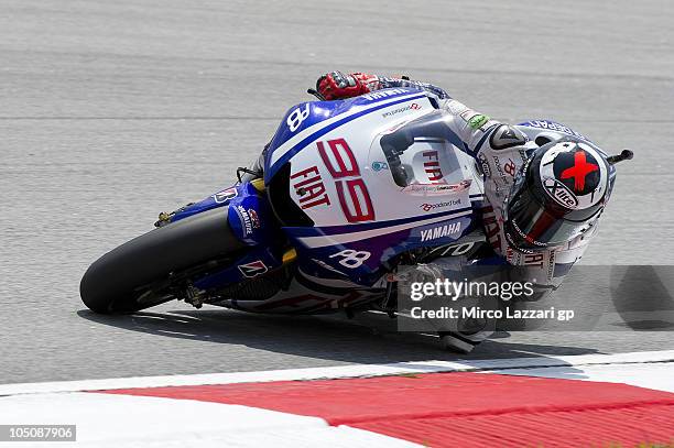 Jorge Lorenzo of Spain and Fiat Yamaha rounds the bend during the qualifying practice of MotoGP of Malaysia at Sepang International Circuit on...