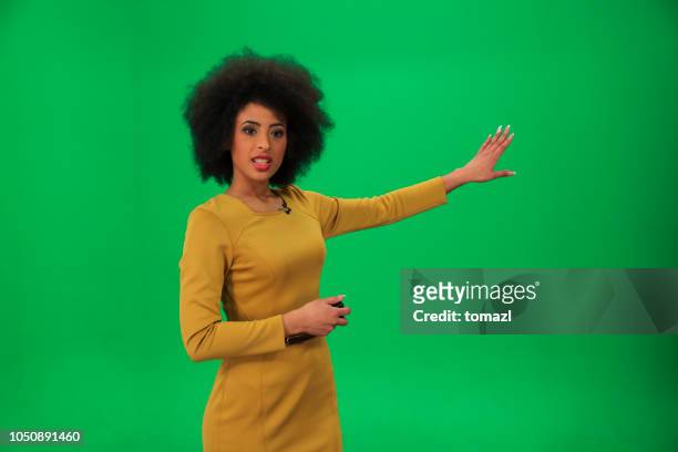 weather forecaster on green background - newscaster stock pictures, royalty-free photos & images