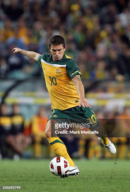 Harry Kewell of Australia shoots at goal during the friendly match between the Australian Socceroos and Paraguay at Sydney Football Stadium on...