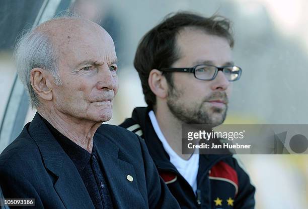 Head oach Dettmar Cramer and head coach Jan Boettcher of Germany talk during the DFB Writers League match between Germany and Argentina on October 8,...
