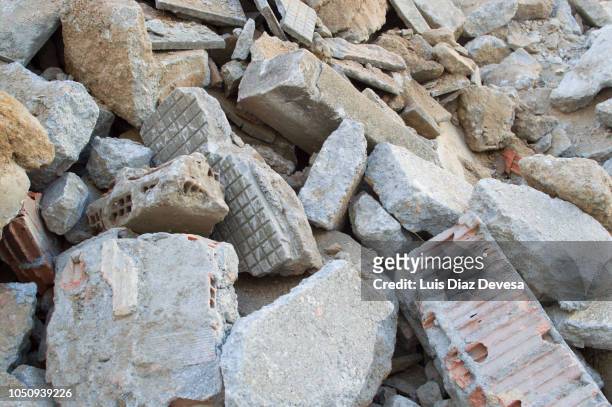 rubble of demolished sidewalk - collapsing stock-fotos und bilder