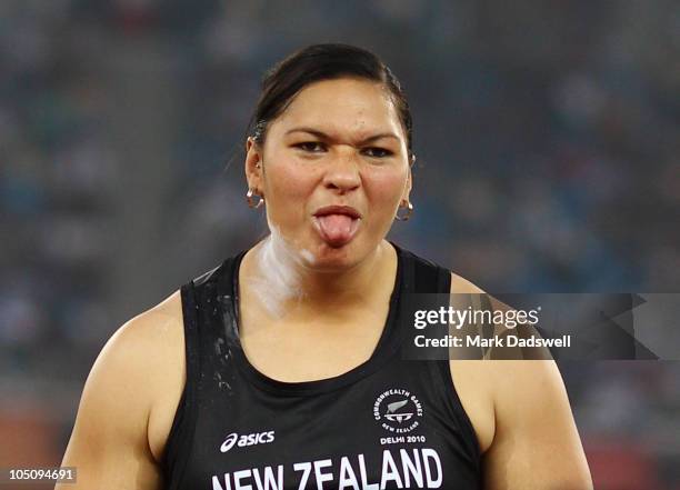 Valerie Adams of New Zealand sticks out her tongue during the women's shot put final at the Jawaharlal Nehru Stadium during day six of the Delhi 2010...