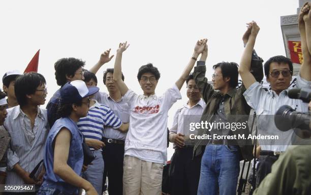 View of demonstrators gathered in Tiananmen Square, among them, singer-composer Hou Dejian , sociologist Zhou Duo , and literary critic Liu Xiaobo ,...