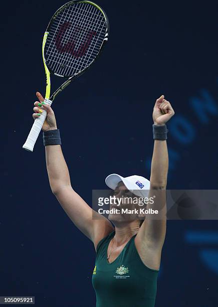 Anastasia Rodionova of Australia celebrates after winning the gold medal in her women's singles final match against Sania Mirza of India at RK Khanna...