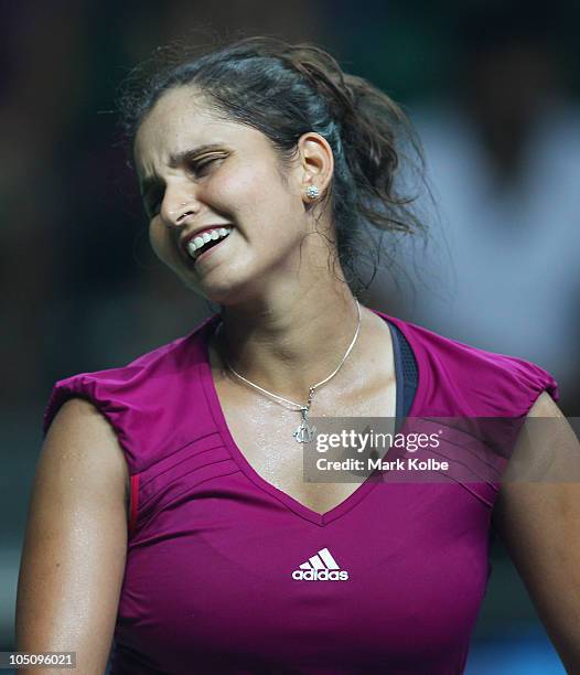 Sania Mirza of India reacts after losing a point during the women's singles final match against Anastasia Rodionova of Australia at RK Khanna Tennis...