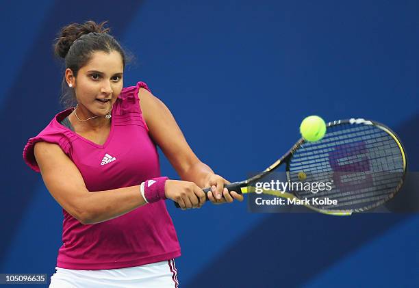 Sania Mirza of India hits a backhand during the women's singles final match against Anastasia Rodionova of Australia at RK Khanna Tennis Stadium on...