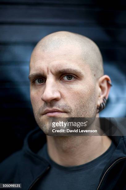 China Mieville , author, poses for a portrait at the Cheltenham Literature Festival on October 9, 2010 in Cheltenham, England.
