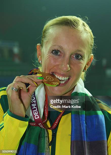 Anastasia Rodionova of Australia poses with the gold medal after winning her women's singles final match against Sania Mirza of India at RK Khanna...
