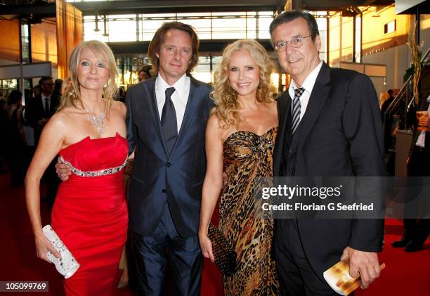Frauke Ludowig and husband Kai Roeffen, Katja Burkard and Hans Mahr attend the German TV Award 2010 at Coloneum on October 9, 2010 in Cologne,...