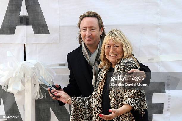 Julian Lennon and Cynthia Lennon, the son and first wife of John Lennon, attend the unveiling of the John Lennon monument 'Peace & Harmony' at...