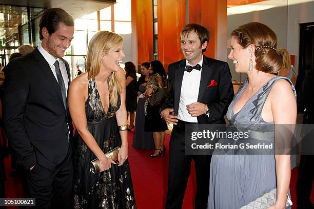 Host Verena Wriedt and boyfriend Marcus Zierk, Arne Schoenfeld and tv host Verena Wriedt attend the German TV Award 2010 at Coloneum on October 9,...