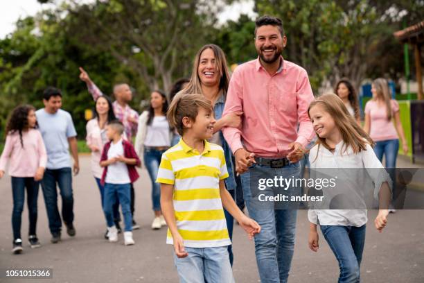 happy family having fun at the park - park festival stock pictures, royalty-free photos & images