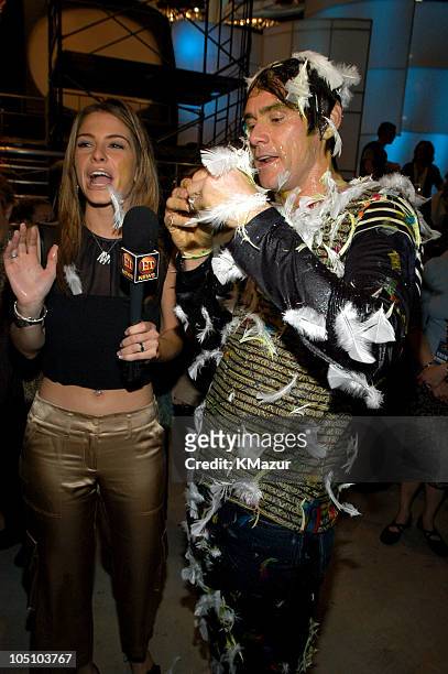 Maria Menounos and Jim Carrey during Nickelodeon Kids Choice Awards 2003 - Backstage at Barker Hangar in Santa Monica, California, United States.