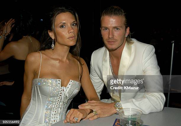 Victoria and David Beckham during 2003 MTV Movie Awards - Backstage and Audience at The Shrine Auditorium in Los Angeles, California, United States.