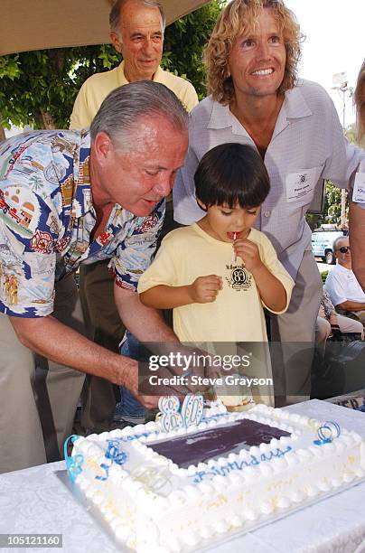 Tom LaBonge and Jesse Sonntag Garcia cut the cake for the 80th Birthday of The Hollywood Sign Celebration