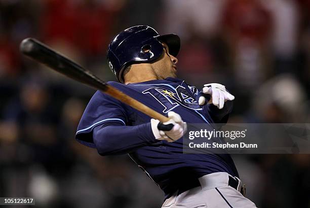 Carlos Pena of the Tampa Bay Rays hits a two run home run in the ninth inning against the Texas Rangers during game three of the ALDS at Rangers...