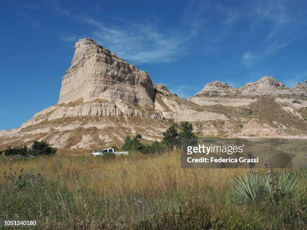 view of scotts bluff national monument from saddle rock trailhead - scotts bluff national monument stock pictures, royalty-free photos & images