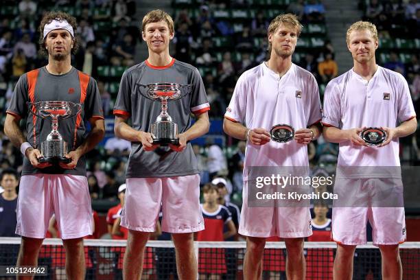 Jean-Julien Roger of the Netherlands Antilles and Eric Butorac of the United States, Andreas Seppi of Italy and Dmitry Tursunov of Russia pose with...