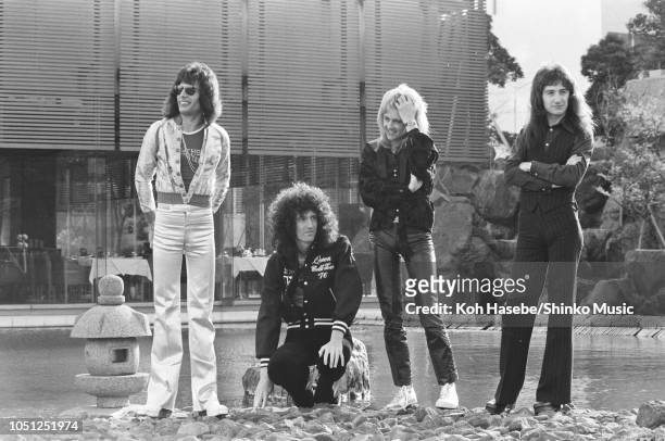 Queen, photo session for 'Music Life' magazine, in the garden of Hotel Pacific Tokyo on their Night At The Opera Japan tour, Tokyo, Japan, 21 March...