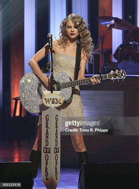 Taylor Swift performs during the Grand Ole Opry 85th birthday bash at the Grand Ole Opry House on October 9, 2010 in Nashville, Tennessee.