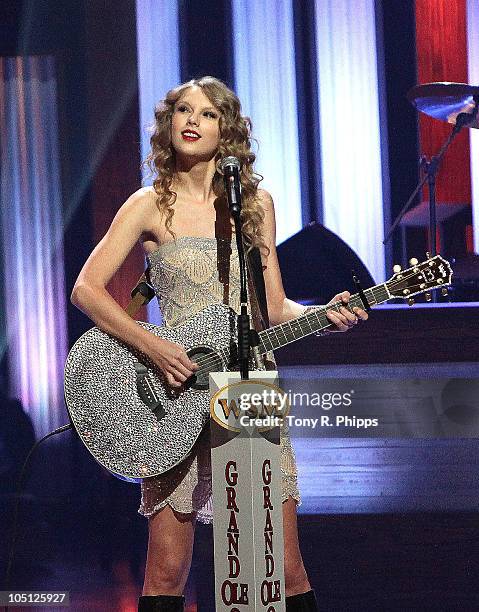 Taylor Swift performs during the Grand Ole Opry 85th birthday bash at the Grand Ole Opry House on October 9, 2010 in Nashville, Tennessee.