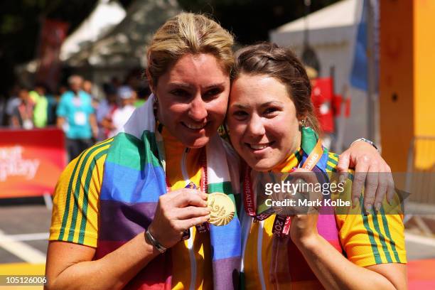 Rochelle Gilmore of Australia and Chloe Hosking of Australia pose during the medal ceremony for the Women's Road Race on the street's of Delhi during...