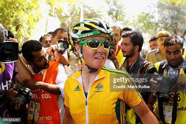 Rochelle Gilmore of Australia celebrates finishing the Women's Road Race in first place and wins the gold medal during day seven of the Delhi 2010...
