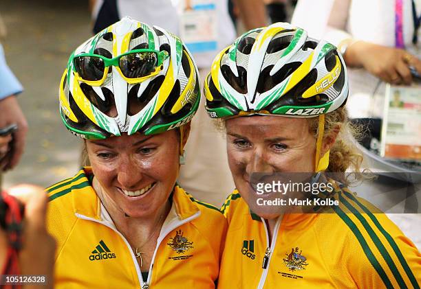 Rochelle Gilmore and Victoria Whitelaw of Australia pose for the media after finishing the Women's Road Race during day seven of the Delhi 2010...
