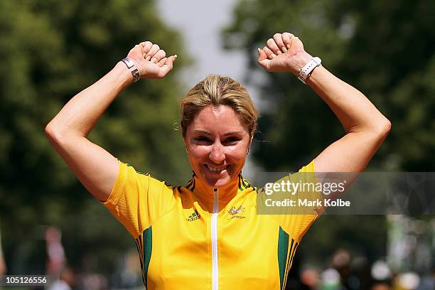 Rochelle Gilmore of Australia celebrates prior to receiving the gold medal during the medal ceremony for the Women's Road Race on the street's of...