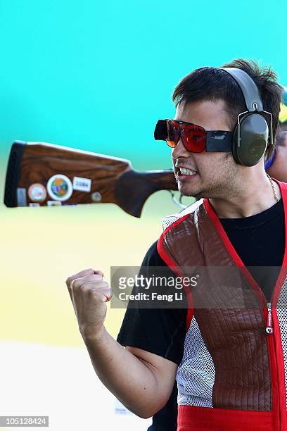 Aaron Heading of England celebrates winning gold in the Men's Singles Trap final at the Dr Karni Singh Shooting Range during day seven of the Delhi...