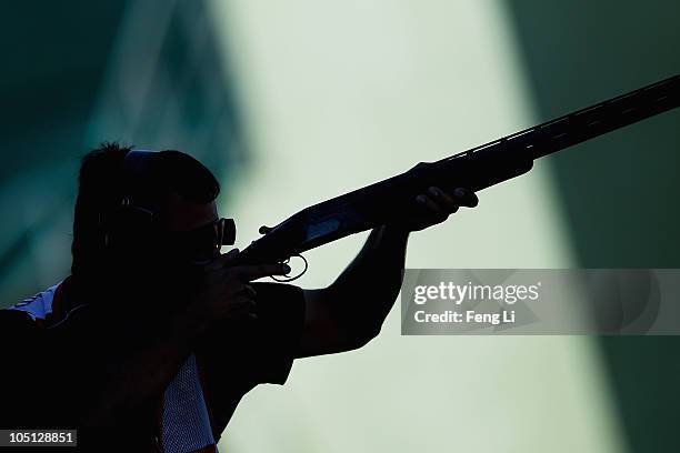 Aaron Heading of England completes in the Men's Singles Trap final at the Dr Karni Singh Shooting Range during day seven of the Delhi 2010...