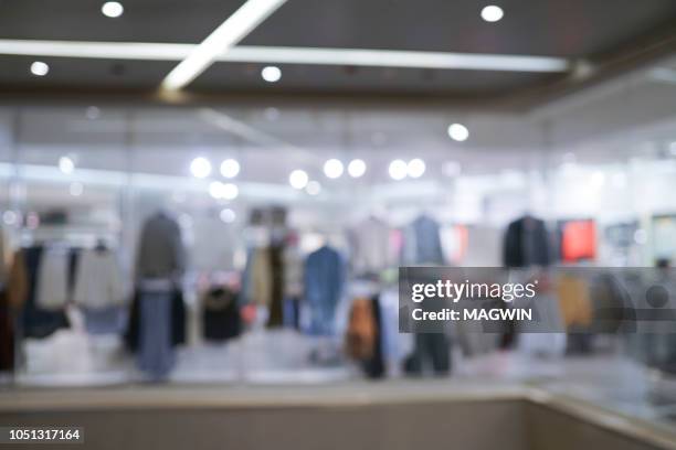abstract background of closh shopping mall - maniquí fotografías e imágenes de stock