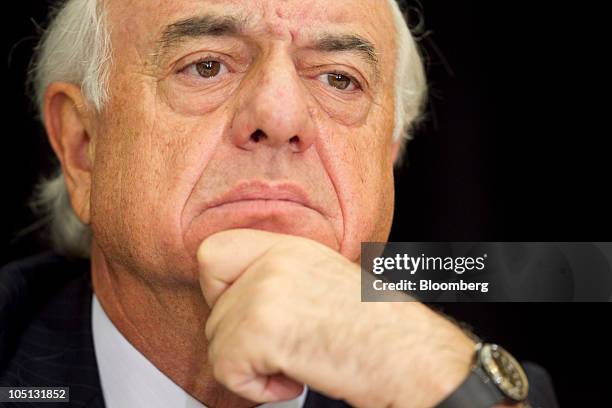 Francisco Gonzalez, chairman and chief executive officer of Banco Bilbao Vizcaya Argentaria SA , listens at a news conference during the Institute of...