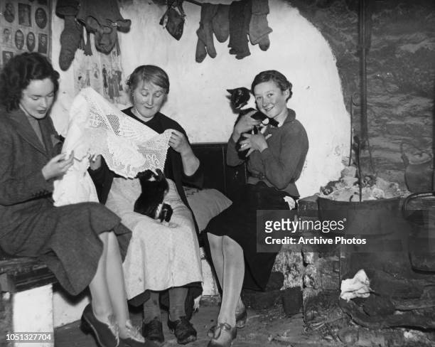 Irish-American actress Maureen O'Sullivan buying Irish lace at a cottage in Wicklow, Ireland, circa 1938. O'Sullivan is in Ireland to visit her...