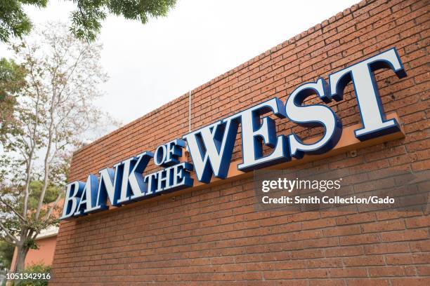 Logo on brick facade of Bank of the West branch, now a division of BNP Paribas, in downtown Livermore, California, October 3, 2018.