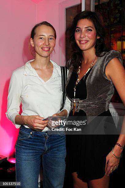 Actress/ director Isild Le Besco and singer Tamara Kaboutchek attend the Featherstone &Co 'GreenTs' Exhibition at the Magda Danysz Gallery on...