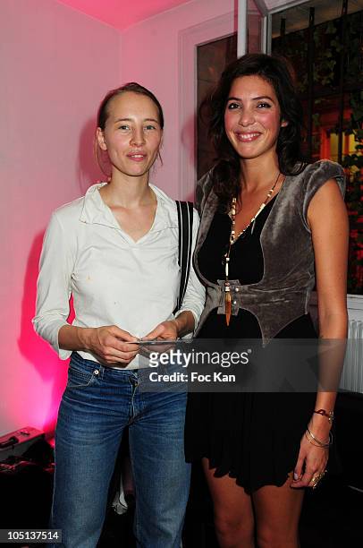 Actress/ director Isild Le Besco and singer Tamara Kaboutchek attend the Featherstone &Co 'GreenTs' Exhibition at the Magda Danysz Gallery on...