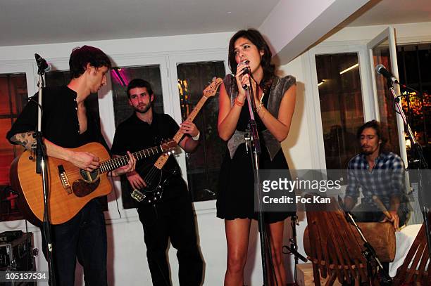 Singer Tamara Kaboutchek and her band perform during the Featherstone & Co 'GreenTs' Exhibition at the Magda Danysz Gallery on September 22, 2010 in...