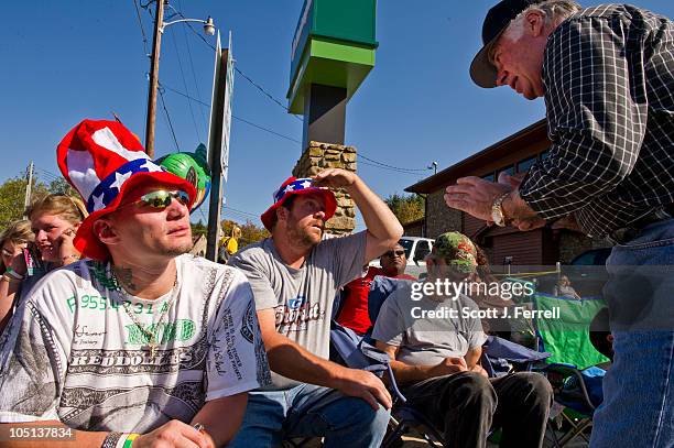 Oct. 09: Republican candidate for U.S. Senate John Raese talks with supporter Mark Mallow, middle, who is an owner operator trucker in the Elkins...