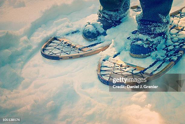 wooden snowshoes in snow - snowshoeing stock pictures, royalty-free photos & images