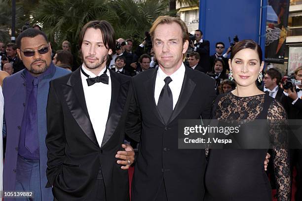 Laurence Fishburne, Keanu Reeves, Hugo Weaving, and Carrie-Anne Moss