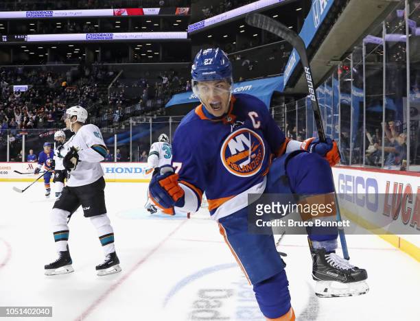 Anders Lee of the New York Islanders scores a powerplay goal at 14:34 of the second period against the San Jose Sharks at the Barclays Center on...