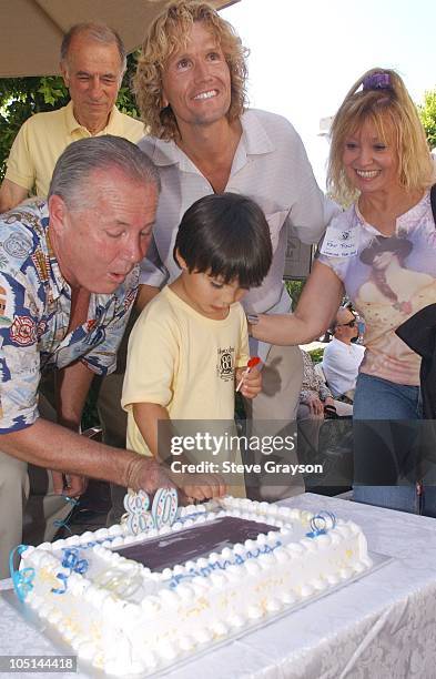 Tom LaBonge and Jesse Sonntag Garcia cut the cake for the 80th Birthday of The Hollywood Sign Celebration