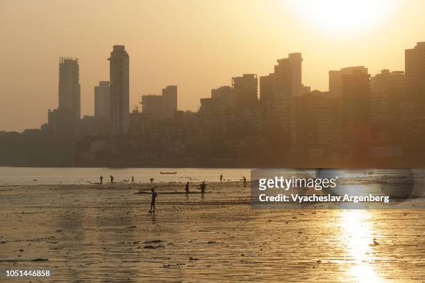 mumbai (bombay) skyline, golden sunset, india - mumbai financial district stock pictures, royalty-free photos & images