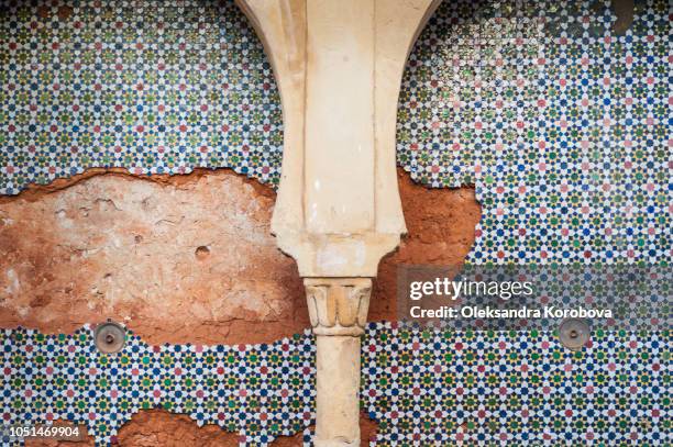 mosaic fountain along the beautiful narrow streets of the kasbah of the udayas in rabat, morocco. - moroccan tile stock pictures, royalty-free photos & images