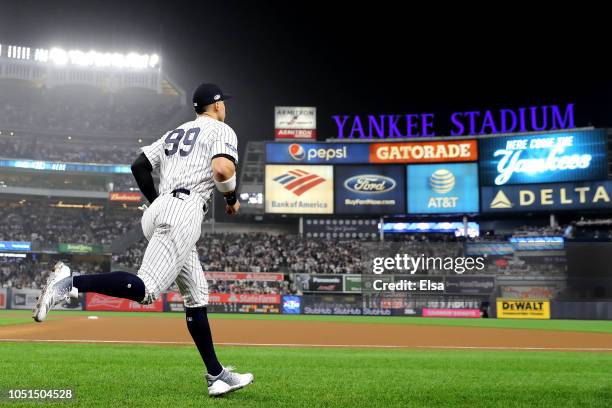 Aaron Judge of the New York Yankees takes the field prior to the start of Game Three of the American League Division Series against the Boston Red...