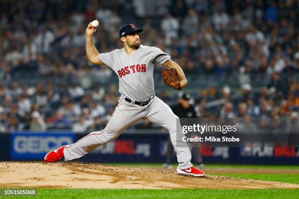Nathan Eovaldi of the Boston Red Sox throws a pitch against the New York Yankees during the first inning in Game Three of the American League...