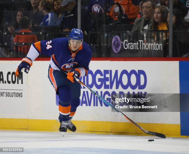 Tom Kuhnhackl of the New York Islanders skates against the San Jose Sharks at the Barclays Center on October 08, 2018 in the Brooklyn borough of New...